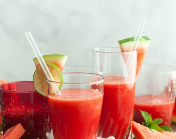 Watermelon Juice in Glasses with lime and watermelon wedges