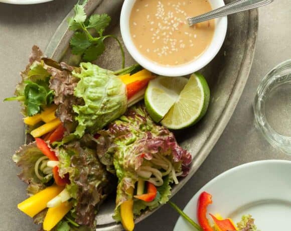 Raw Vegan Lettuce Wraps in Dish with Sauce