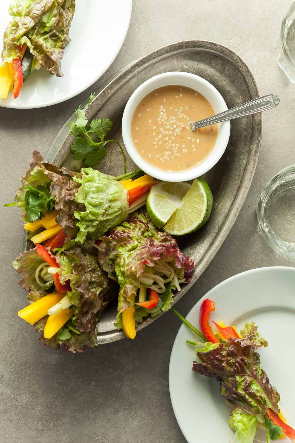 Raw Vegan Lettuce Wraps in Dish with Sauce