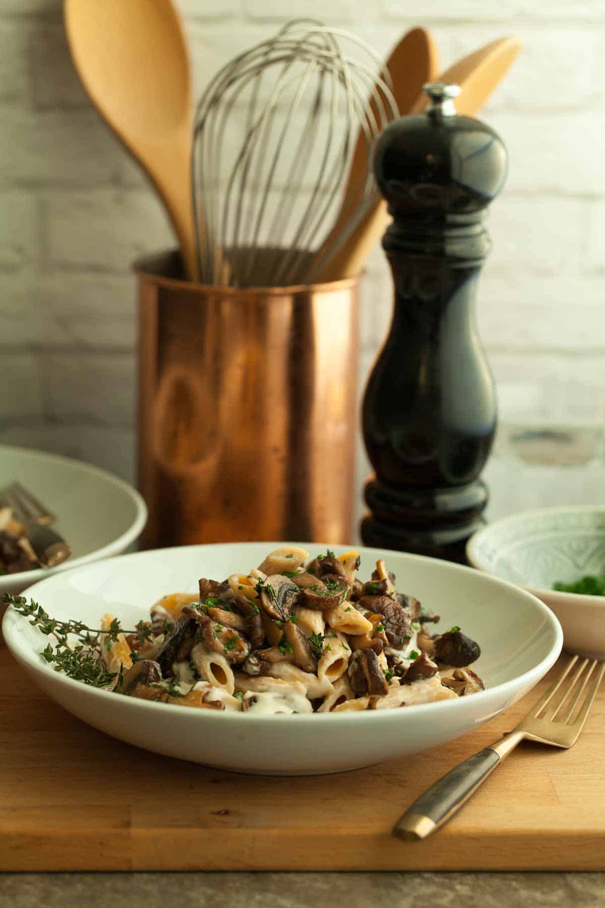 creamy vegan mushroom pasta in serving dish