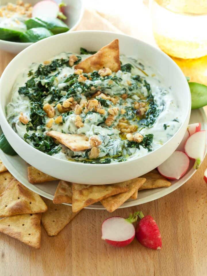 Spinach Yogurt Dip in Bowl with Crackers