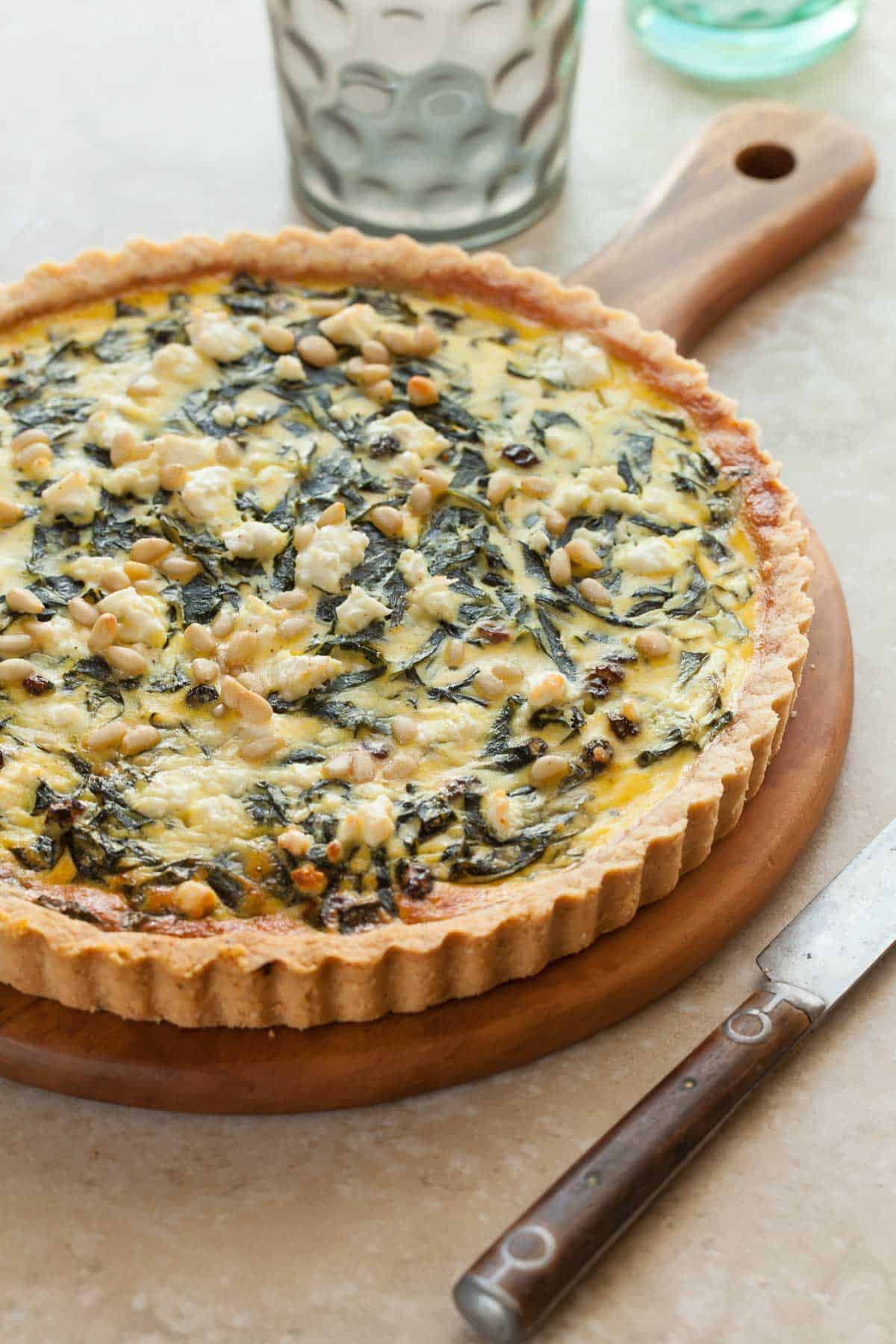 swiss chard tart on serving board