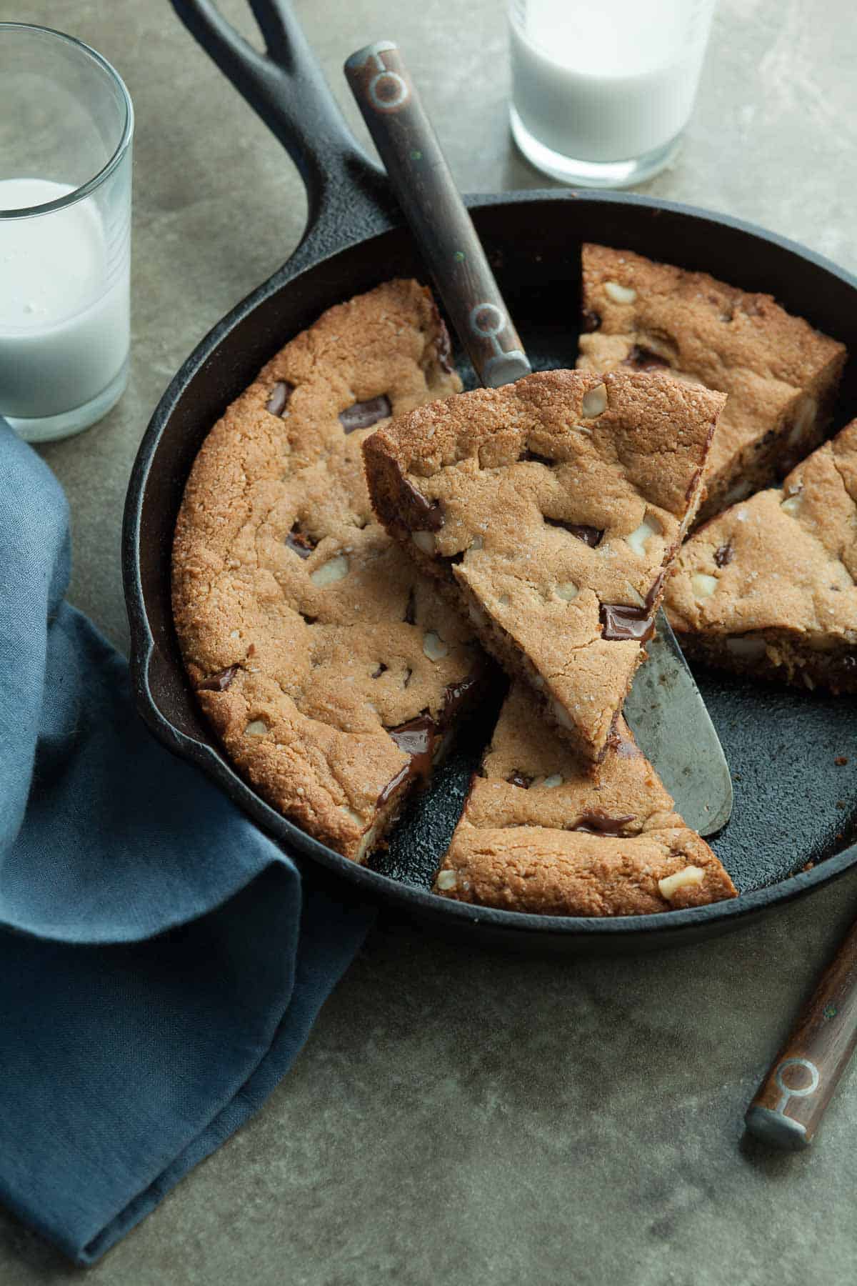 Gluten-Free Chocolate Chip Skillet Cookie Sliced in Pan