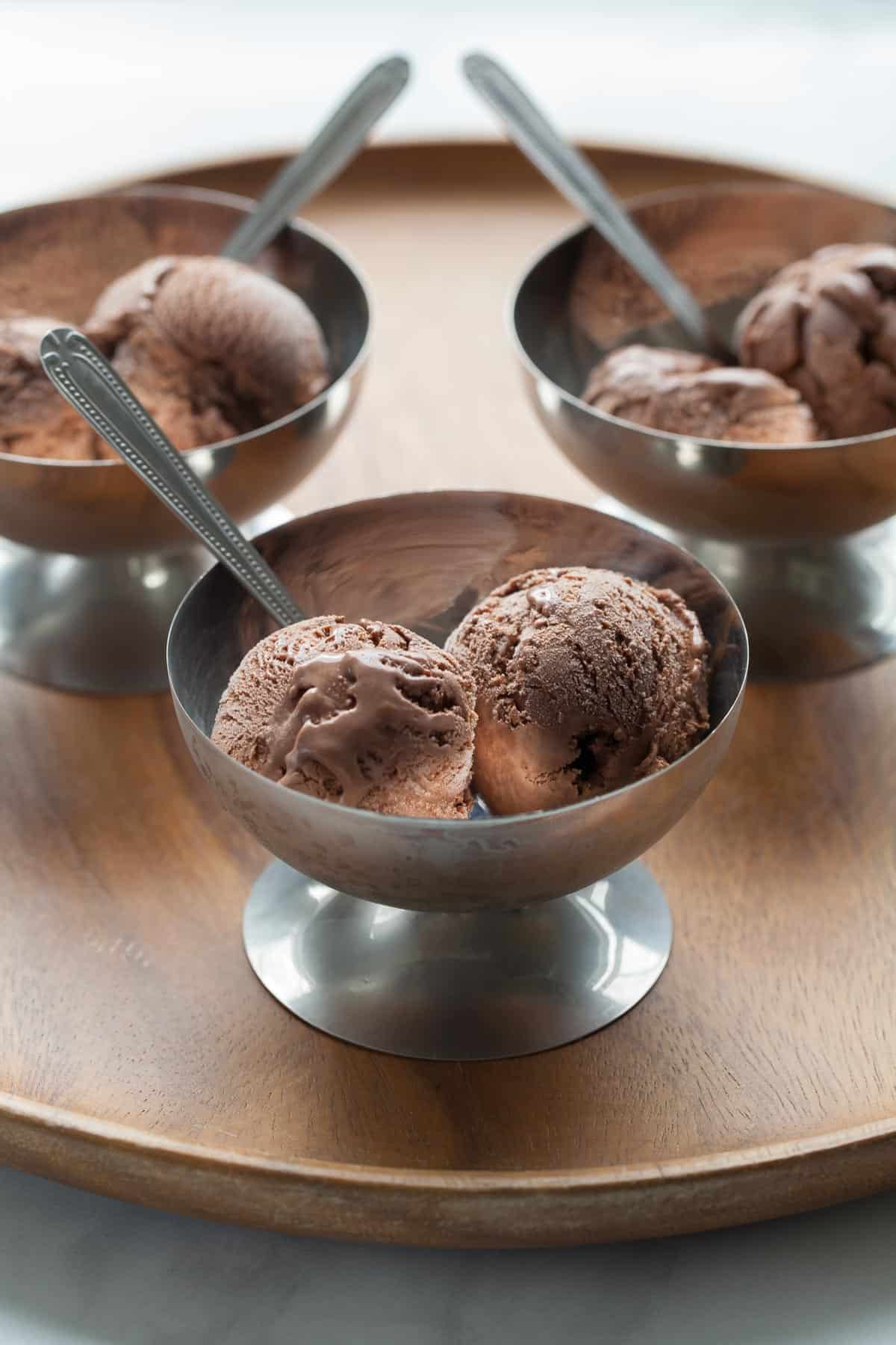 chocolate gelato in bowls on serving tray