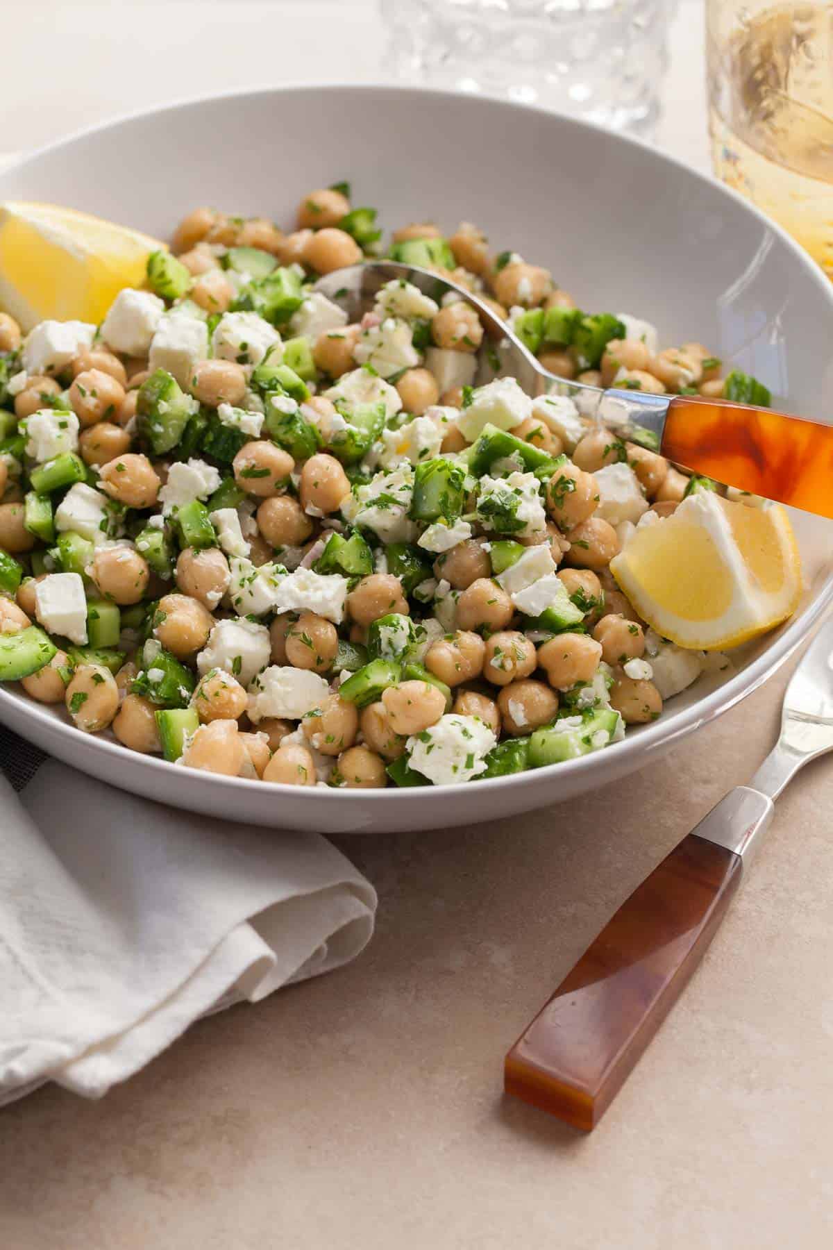 Chickpea Cucumber Feta Salad in bowl with spoon