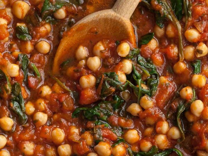 Close up of chickpeas and tomato sauce in pan