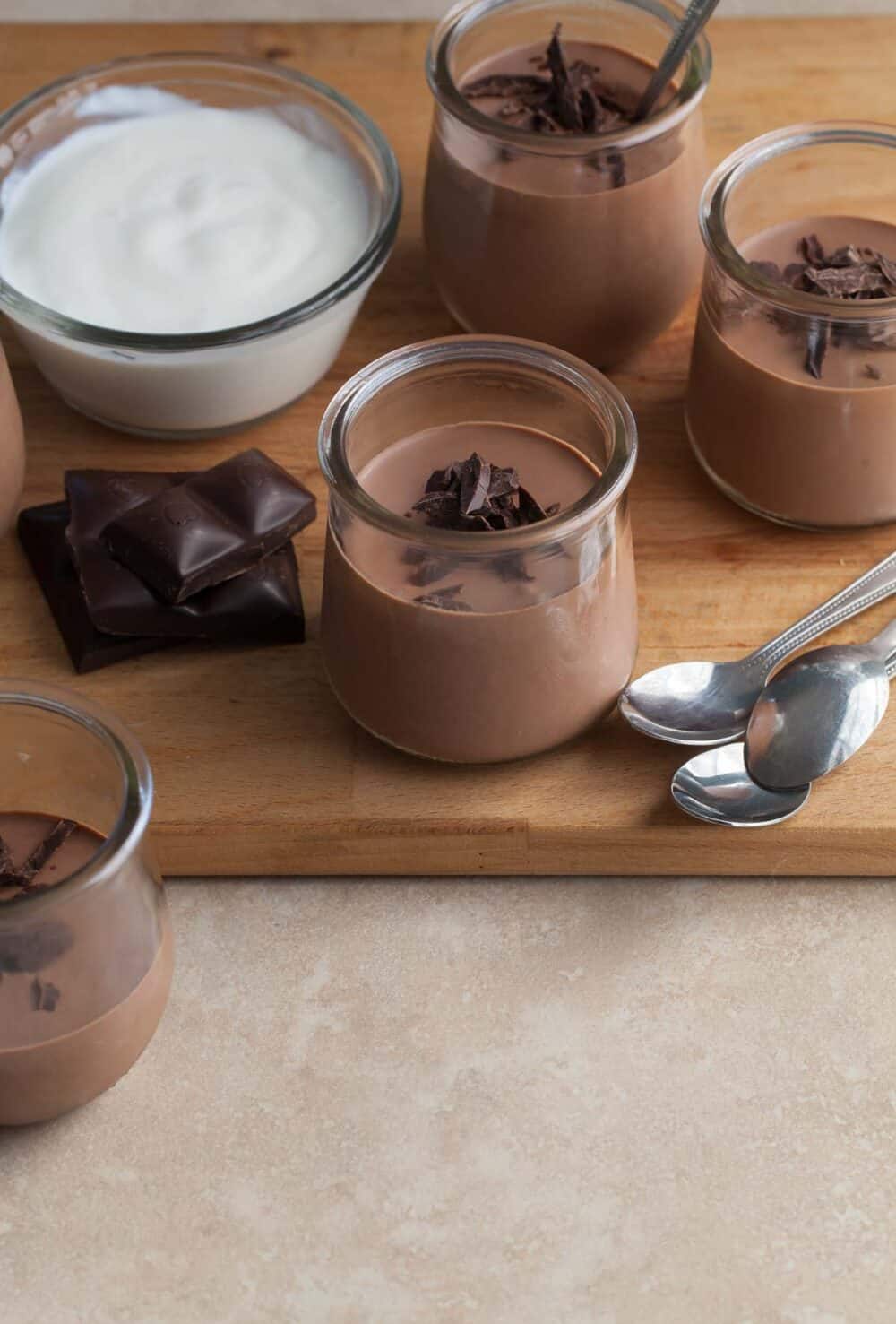 easy chocolate yogurt served in glass pots topped with chocolate shavings