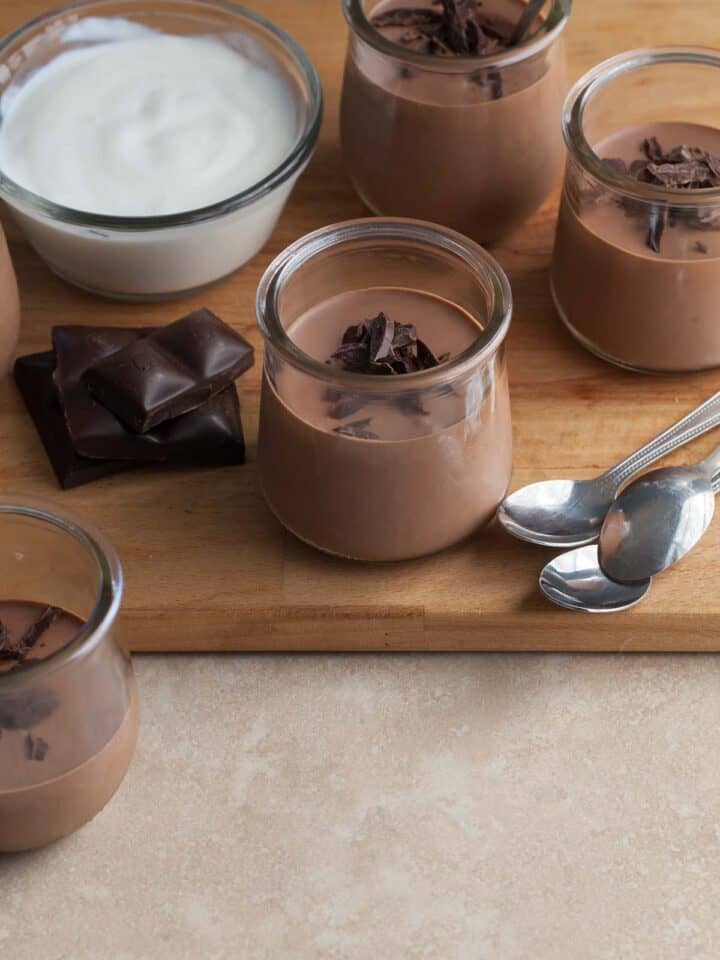 easy chocolate yogurt served in glass pots topped with chocolate shavings