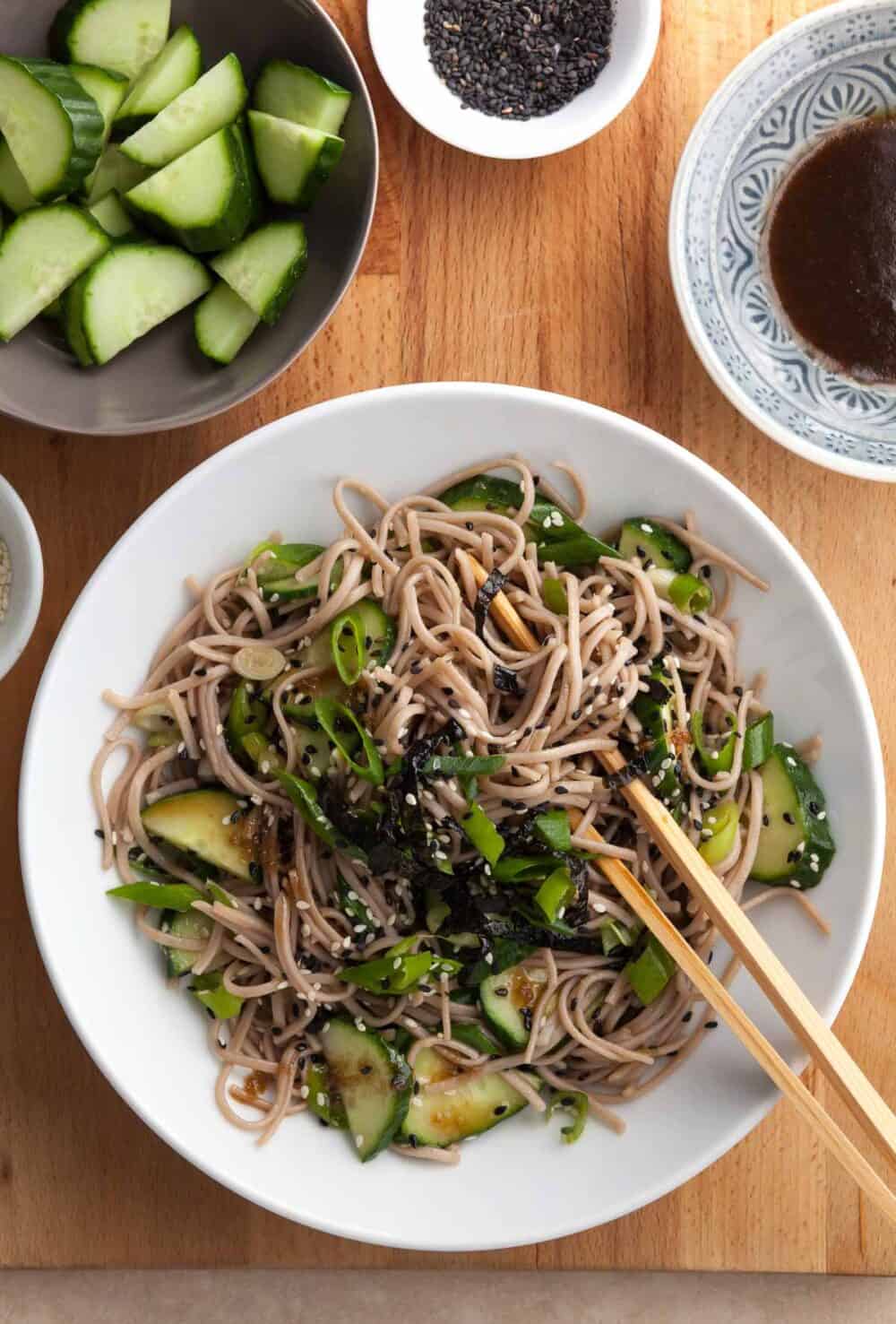 sesame soba noodles tossed in a sesame dressing and topped with scallions and sesame seeds