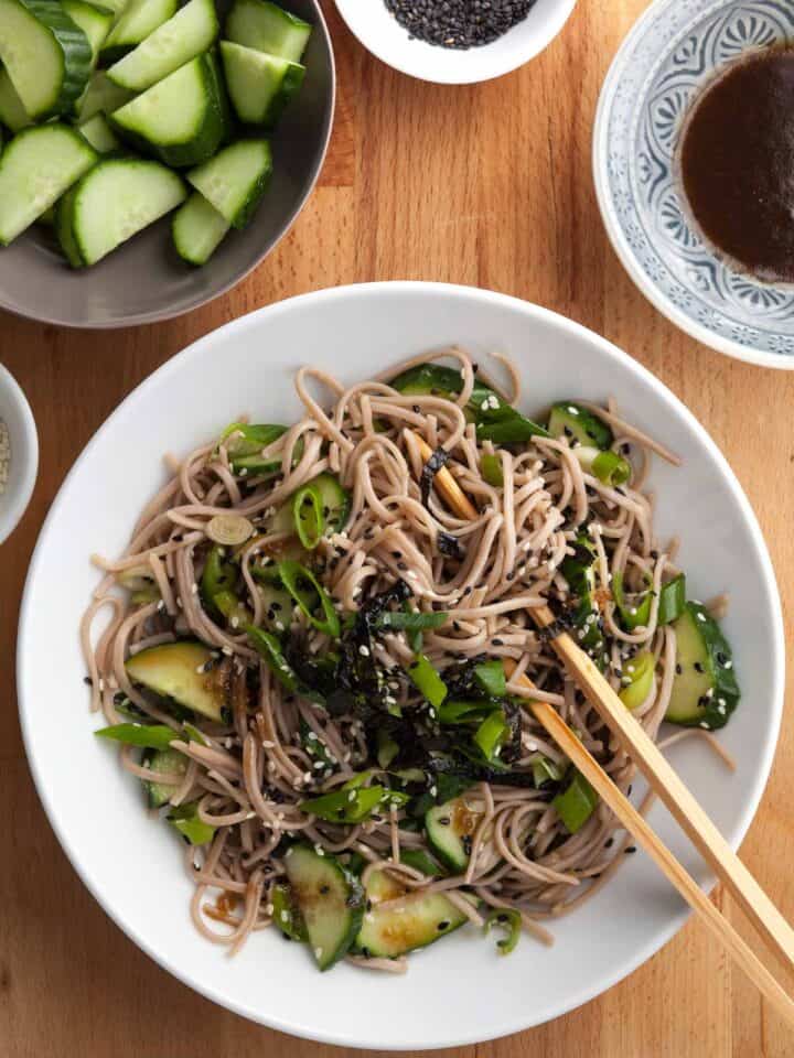 sesame soba noodles tossed in a sesame dressing and topped with scallions and sesame seeds