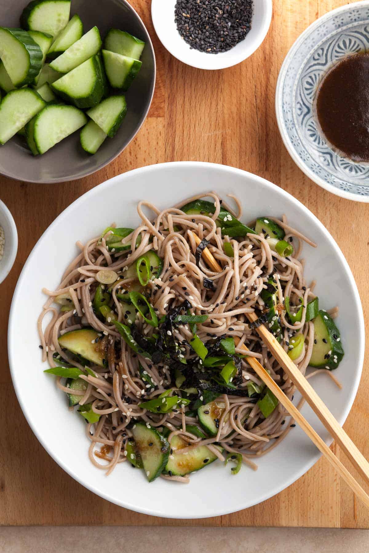 sesame soba noodles tossed in a sesame dressing and topped with scallions and sesame seeds