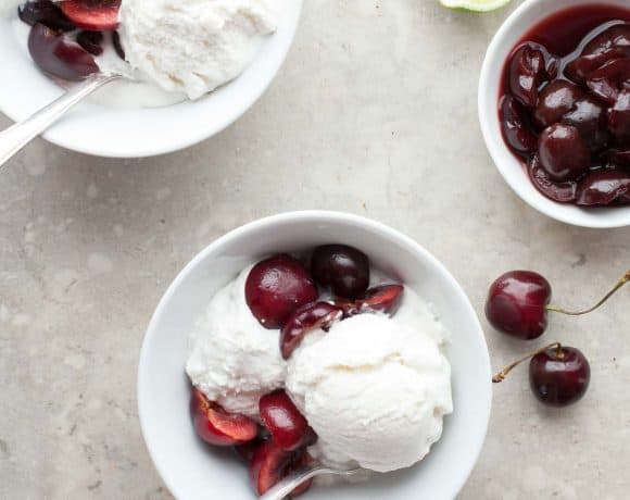 Coconut sorbet served with cherries on top