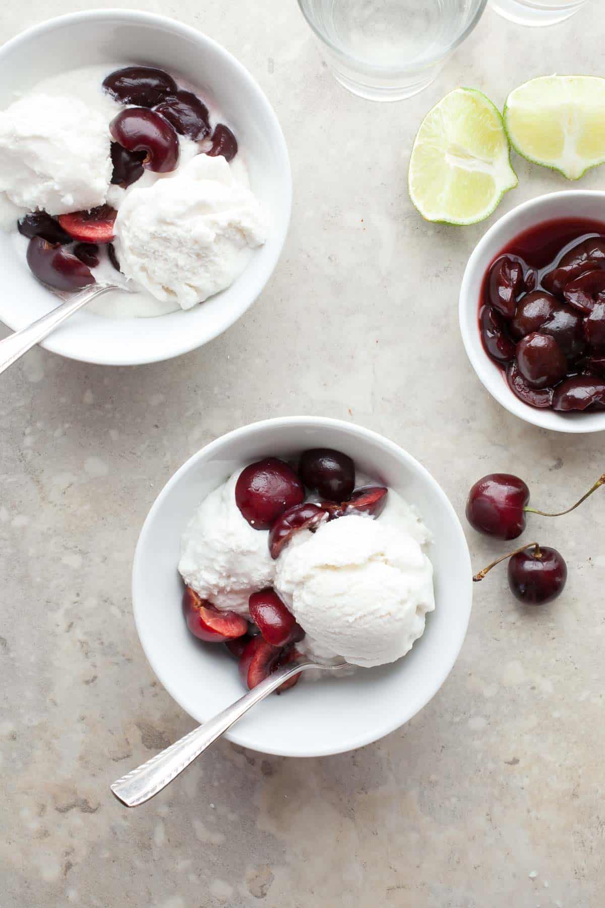 Coconut sorbet served with cherries on top