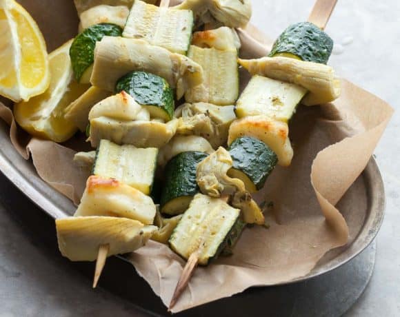 Finished halloumi vegetable skewers on serving platter for summer meal