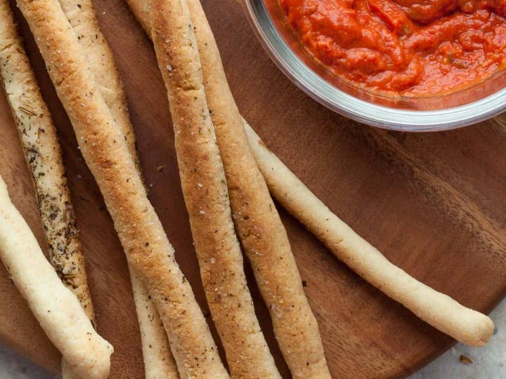 Easy gluten-free grissini next to dipping sauce