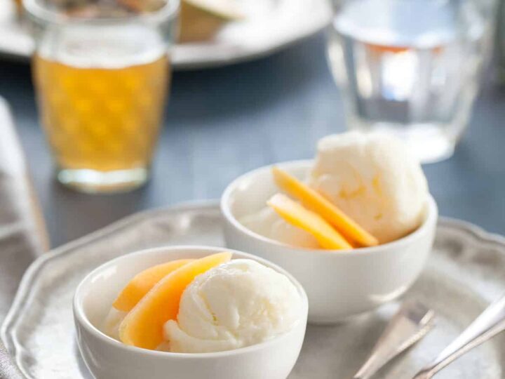 Creamy honey frozen yogurt made with goat milk yogurt in small bowls