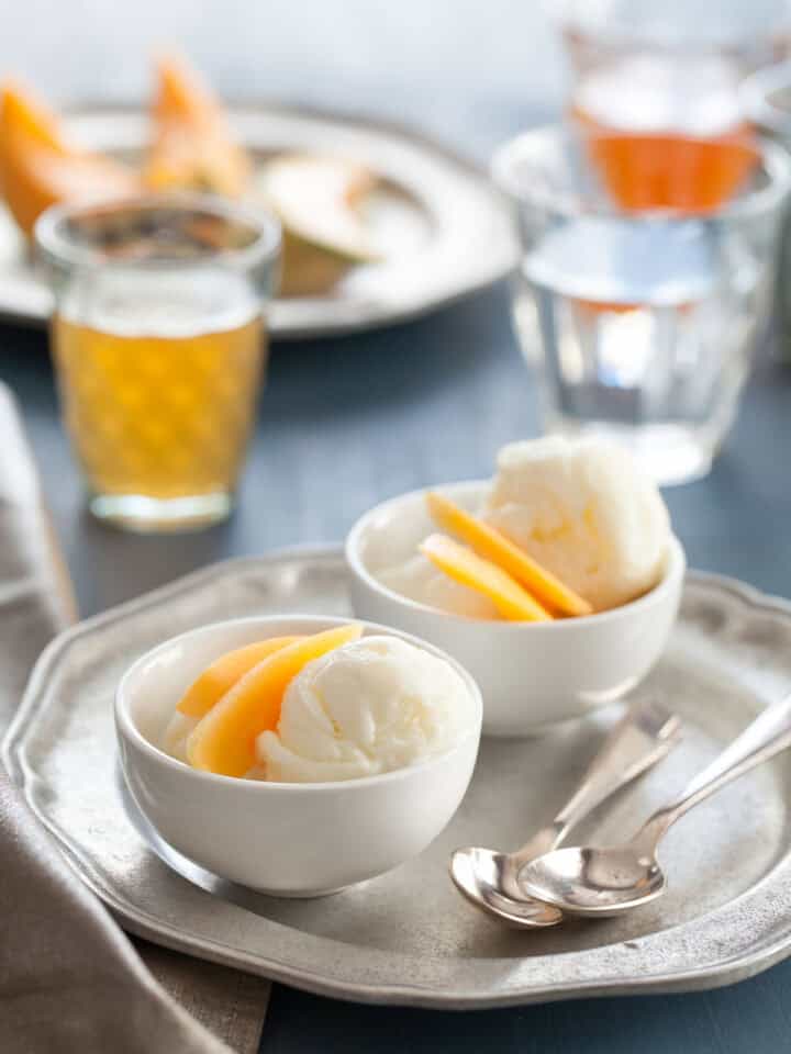 Creamy honey frozen yogurt made with goat milk yogurt in small bowls