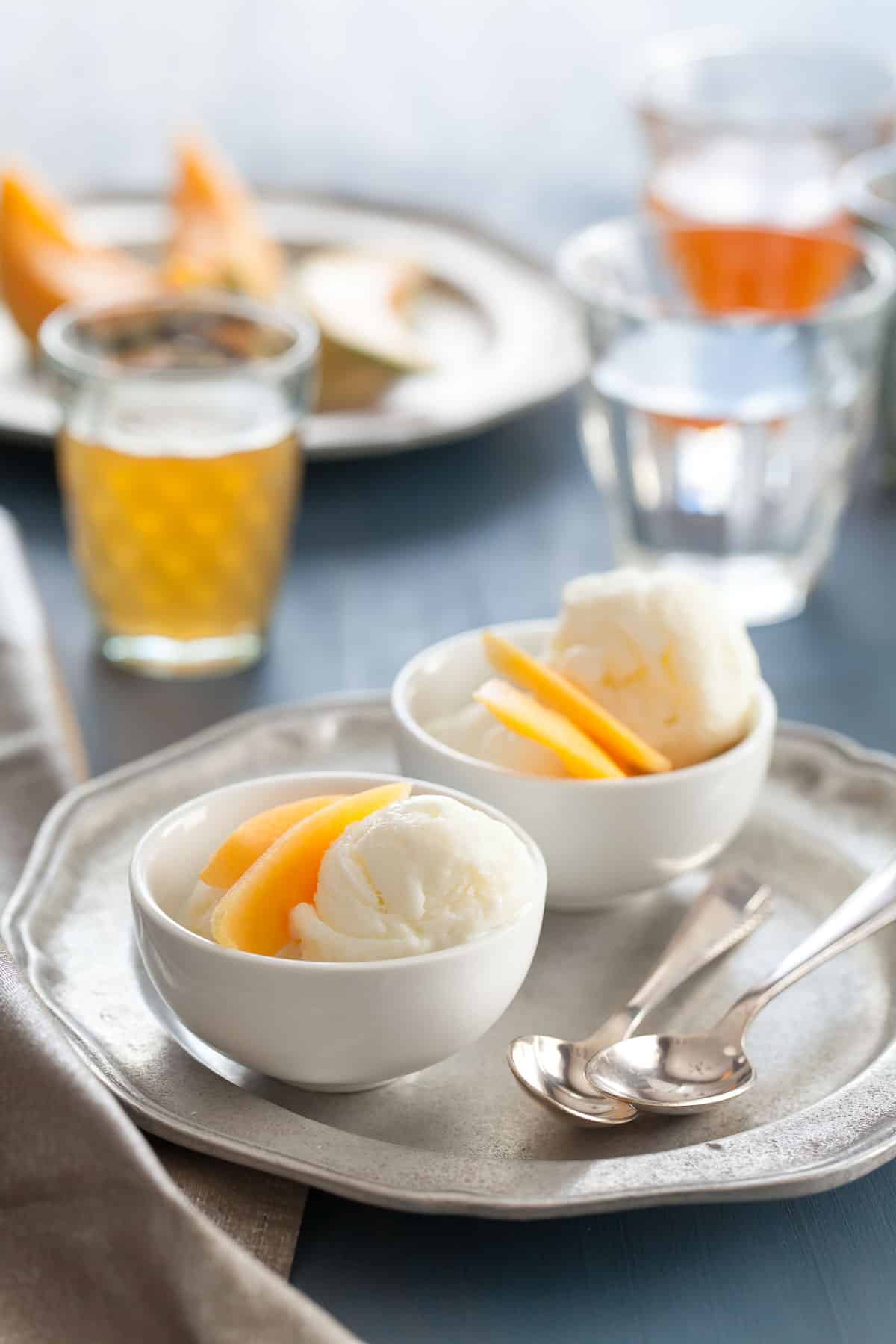 Creamy honey frozen yogurt made with goat milk yogurt in small bowls