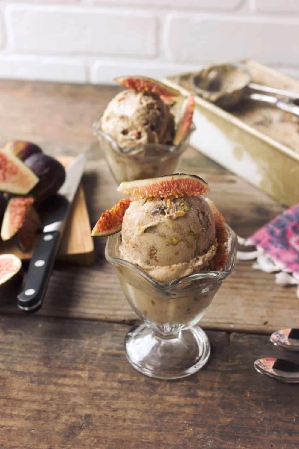 Scoops of fig ice cream topped with fresh figs