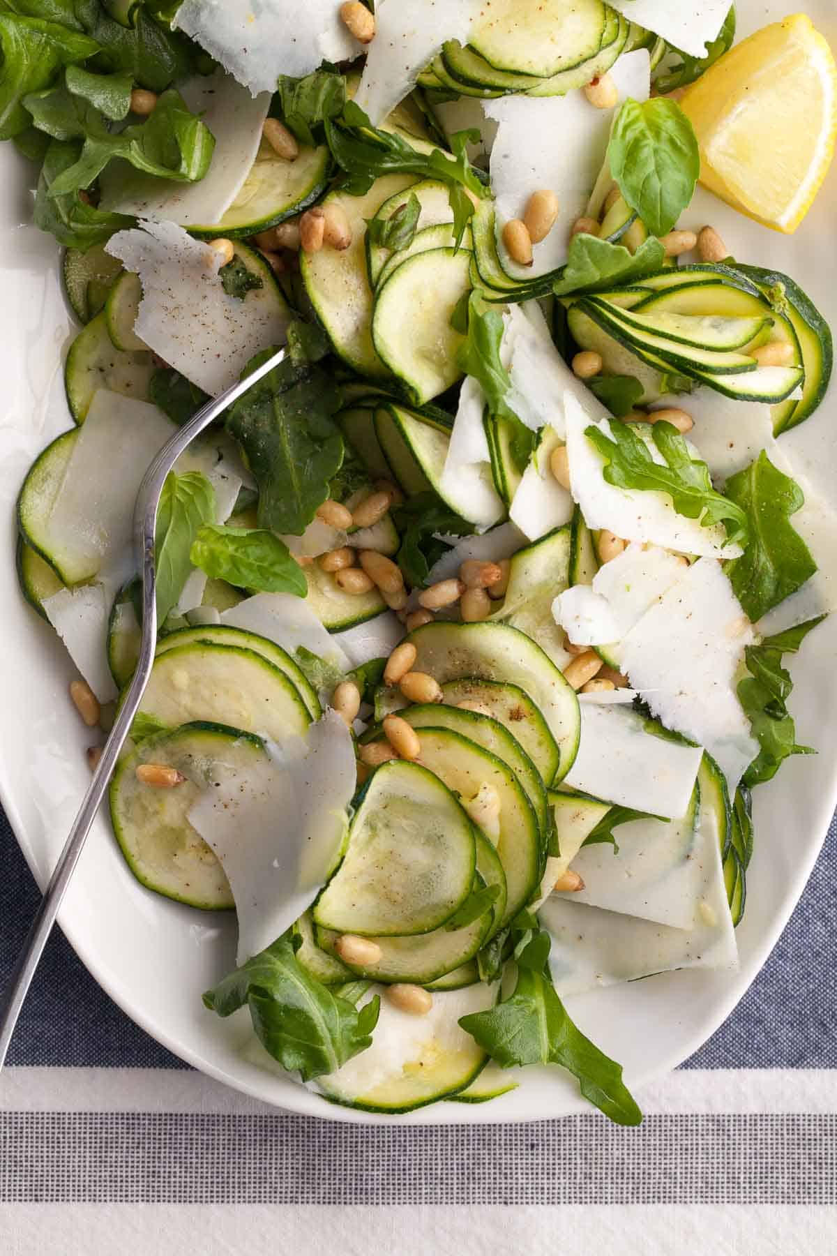 Shaved Zucchini Salad (Italian Carpaccio Style) on plate with pecorino cheese