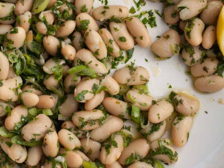 lemon herb white bean salad close up on plate