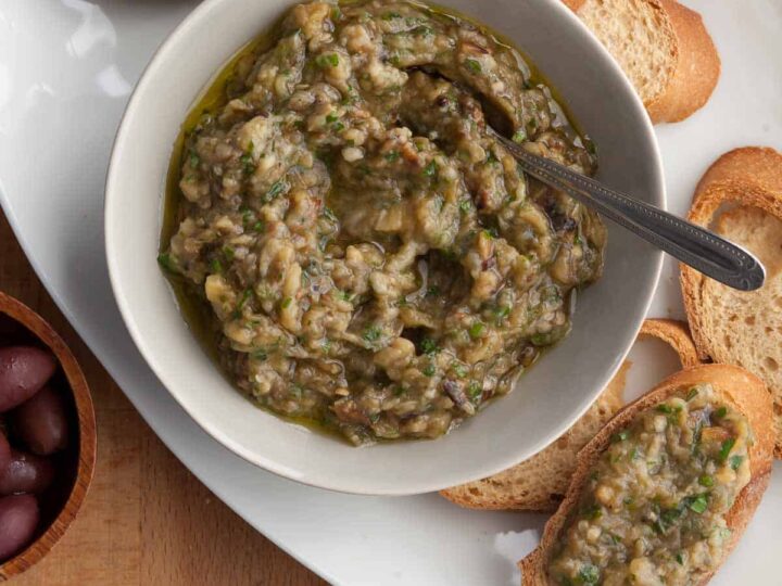 French eggplant spread made with eggplant, olive oil, herbs and garlic in bowl