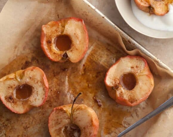 easy roasted apples with cinnamon, butter and maple syrup on sheet pan
