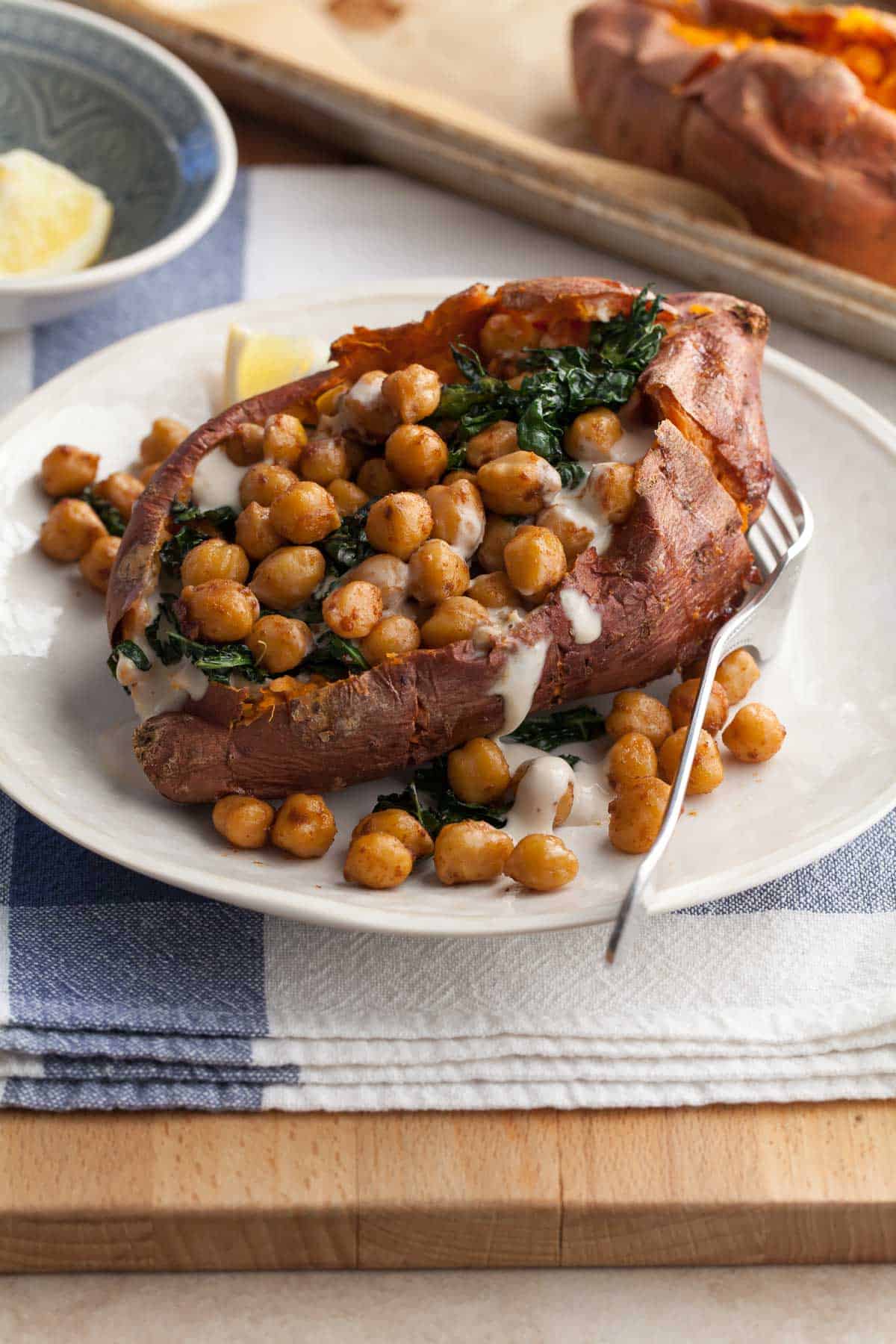 Chickpea Stuffed Sweet Potatoes with Kale and Tahini Sauce