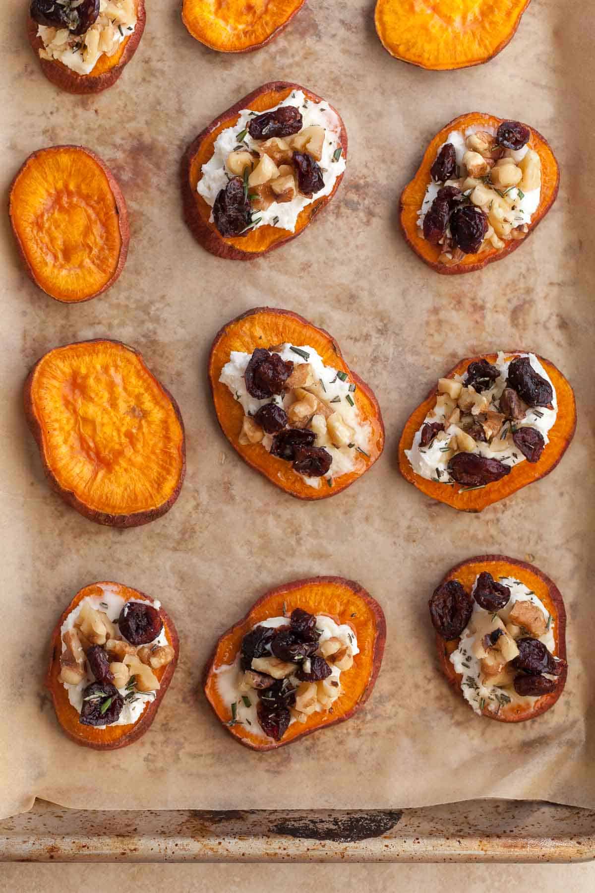 Sweet Potato Crostini Topped with Goat Cheese, Walnuts and Cranberries on Sheet Pan